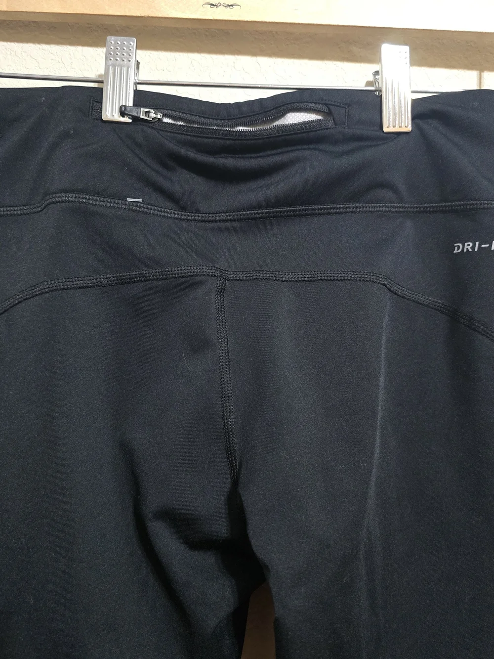 Nike Women's Black Athletic Leggings with Reflective Swoosh